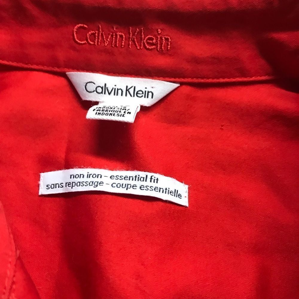 Calvin Klein size XS re red blouse in perfect condition